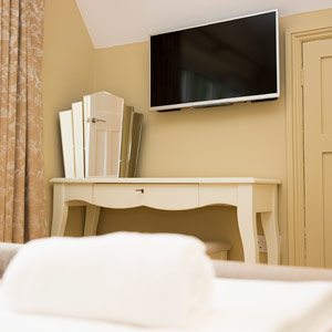 Photo of the master bedroom at River Cottage
