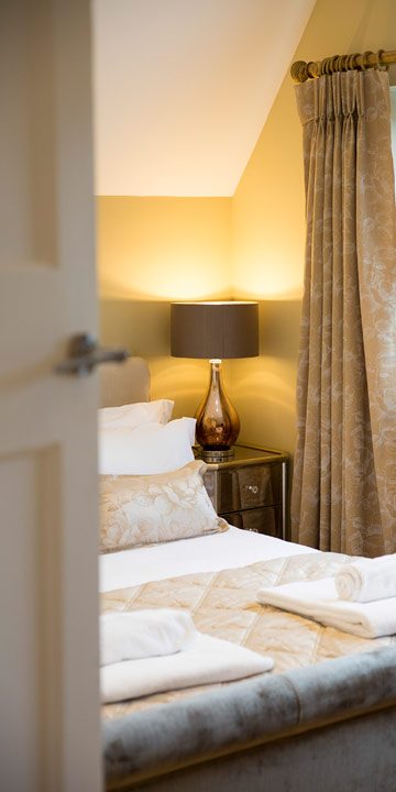 Photo of the master bedroom at River Cottage