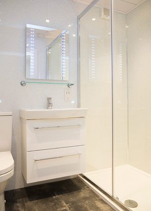 Photo of the second bathroom featuring a drench shower at River Cottage